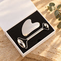 Stainless steel face roller and gua sha board in their gift box